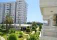 Buy Apartments in a European complex on the first line from the sea in Tosmur 16