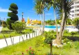 Buy Apartments in a European complex on the first line from the sea in Tosmur 18