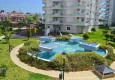 Buy Apartments in a European complex on the first line from the sea in Tosmur 7