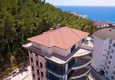Buy Luxurious duplex apartment with garden access and sea views in Kargicak 18 