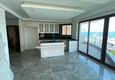 Affordable Purchase  Luxurious duplex apartment with garden access and sea views in Kargicak 2 