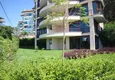 Buy Luxurious duplex apartment with garden access and sea views in Kargicak 4 