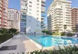 Buy Flat in Mahmutlar in a modern residential cite 5 