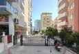 Buy Flat in Mahmutlar in a modern residential cite 13 