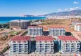 Buy Flat in Kestel with a partial sea view in a comfortable complex 9
