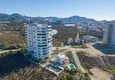 Buy Apartment in Mahmutlar with designer interior, sea and mountain views 3 