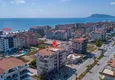 Buy Furnished apartment in the Kestel district with a glazed balcony and mountain views 1