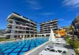 Buy 1+1 furnished apartment with sea view, Kargicak area - Alanya 1