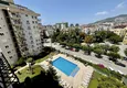 Affordable Purchase  Apartment 1 + 1 with furniture and mountain views in a complex with infrastructure, the center of Alanya 12 