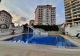 Buy Apartment 2 + 1 with the author's interior and sea views in the area open for residence permit, Cikcilli - Alanya 1