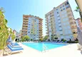 Buy Apartment 1 + 1 with furniture and mountain views in a complex with infrastructure, the center of Alanya 5 