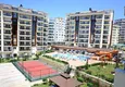 Buy Apartment 1+1 furnished with a glazed balcony and sea views, Avsallar area - Alanya 1