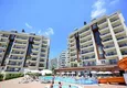 Buy Apartment 1+1 furnished with a glazed balcony and sea views, Avsallar area - Alanya 3