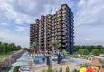 Buy Apartments at affordable prices in a residential complex under construction Cesmeli-Mersin 1