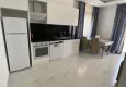 Affordable Purchase 1+1 apartment for rent in Mahmutlar for a summer vacation with new furniture No. 1 5