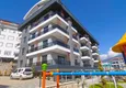 Buy 1+1 apartment with furniture and mountain views in a modern boutique complex, Oba district — Alanya 1 