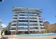 Buy \ Apartment 2 + 1 furnished in a residential complex on the first coastline, Tosmur area - Alanya 2 
