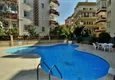 Buy 4+1 penthouse duplex with furniture and sea views in an area open to residence permits, Tosmur — Alanya 6