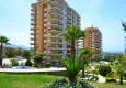 Buy Panoramic two-bedroom apartment with furniture, glazed balcony in Mahmutlar 6