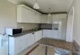 Affordable Purchase Panoramic two-bedroom apartment with furniture, glazed balcony in Mahmutlar 10