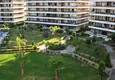 Buy Real estate for residence permit. Apartment with furniture and glazed balcony in Tosmur - Alanya 12 