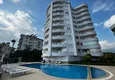 Buy Real estate for citizenship and residence permit. Apartment in the Tosmur area with furniture and sea views 4