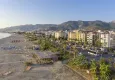 Buy Turnkey apartment on the beachfront in Alanya, Oba district. Suitable for a residence permit 4 
