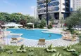 Buy Apartments 4+1 with sea view in a new residential complex in Davultepe-Mersin area 7