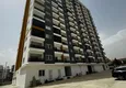 Buy One bedroom Apartment with Fine Finishing and Mountain View in Tomyuk District, Mersin. Installment is possible 18 