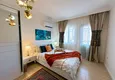Affordable Purchase Real estate for residence permit - Apartment with modern interior and sea view in Tosmur, Alanya 13 