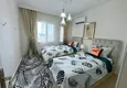 Affordable Purchase Real estate for residence permit - Apartment with modern interior and sea view in Tosmur, Alanya 16 