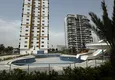 Buy One bedroom Apartment with Fine Finishing and Mountain View in Tomyuk District, Mersin. Installment is possible 4 