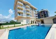 Buy 1+1 apartment with mountain and sea views, Kargicak district in Alanya 1