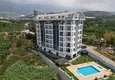 Buy Duplex penthouse with fine finishing and sea view in Mahmutlar, Alanya 1 