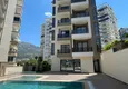 Buy Turnkey one-bedroom apartment with mountain views in a modern residential complex — Alanya, Mahmutlar district 2 