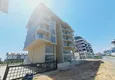 Buy 1+1 apartment with mountain and sea views, Kargicak district in Alanya 6