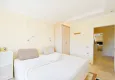 Affordable Purchase Two-bedroom apartment on the beachfront - Tosmur district, Alanya 13