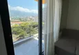 Affordable Purchase 1+1 apartment with new furniture mountain views in a modern complex - Mahmutlar district, Alanya 13