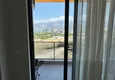 Affordable Purchase 1+1 apartment with new furniture mountain views in a modern complex - Mahmutlar district, Alanya 14