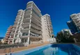 Buy A three-room apartment with new furniture in Tosmur, Alanya is an ideal choice for living and relaxing! 1