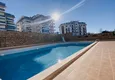 Buy A three-room apartment with new furniture in Tosmur, Alanya is an ideal choice for living and relaxing! 3