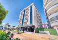 Buy Linear 4+1 apartment with a modern interior in a complex on the beachfront in Alanya, Oba district 2 