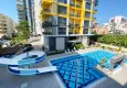 Buy Linear 3+1 apartment with separate kitchen, new furniture and partial sea view - Mahmutlar district, Alanya 2