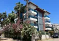 Buy 1+1 apartment with furniture and a glazed balcony in the center of Alanya — Cleopatra beach area 1 