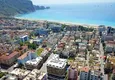 Buy 1+1 furnished apartment with mountain views, Alanya center Cleopatra beach area 1 