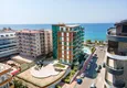 Buy Furnished apartment in the Oba area in a complex on the seafront 1 