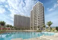 Buy 1+1 apartment with sea view in Mersin — Arpachbakhshish, in a complex under completion 1