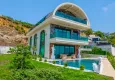 Buy A fashionable triplex with an exclusive design in Kargicak district, Alanya 1 