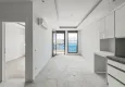 Affordable Purchase 1+1 apartment with a glazed balcony and sea view, Kargicak district — Alanya 2 