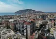 Buy Turnkey 2+1 apartment with glazed cormorants and sea views in the center of Alanya 2